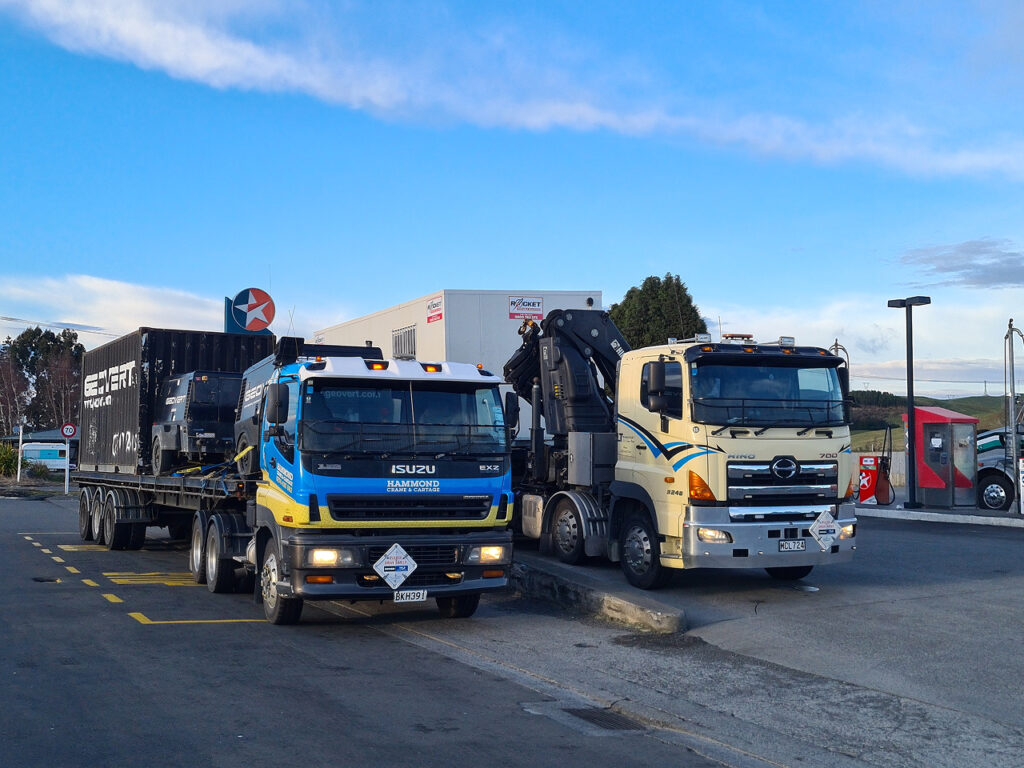 Hammond & Crane SCANIA Transporter truck BKH391 Parked next to a LT transport HIAB truck