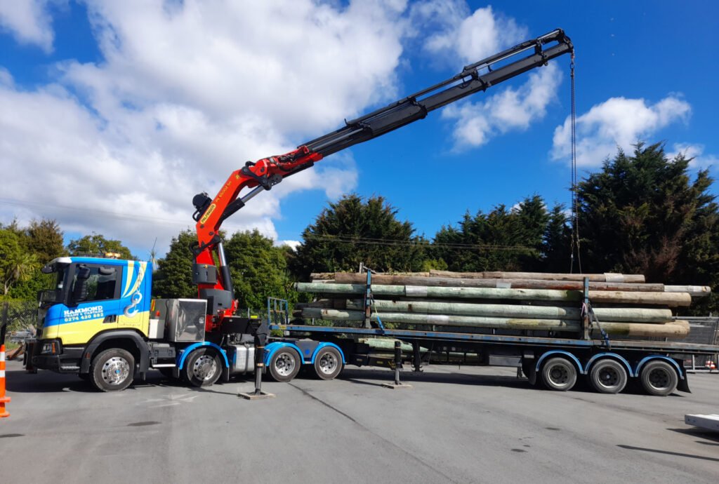 Hammond Crane & Cartage HIAB truck Scania -P450-PK65002 loading or unloading goods